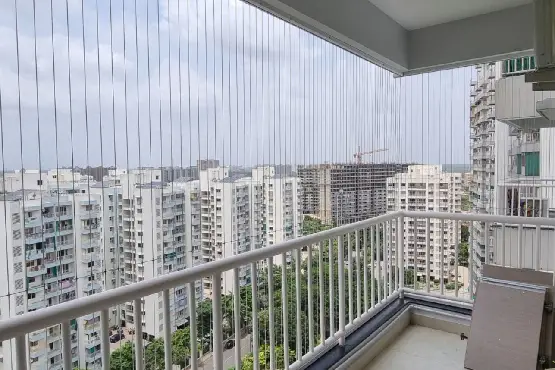 Invisible grill installed on a Mumbai balcony